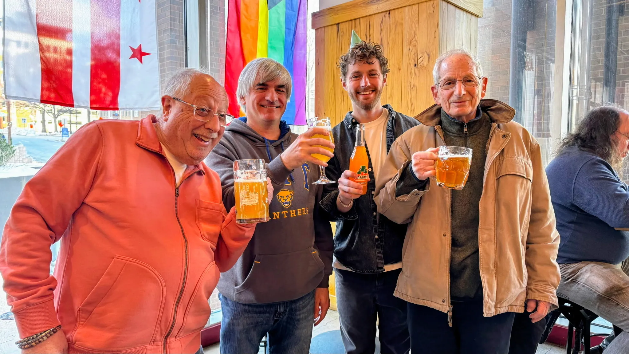 Ray, Zach and friends raising a toast
